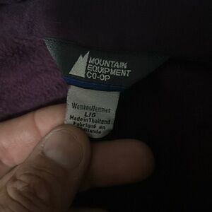 Mountain equipment co-op sweater vest. Dark Purple in color. size large